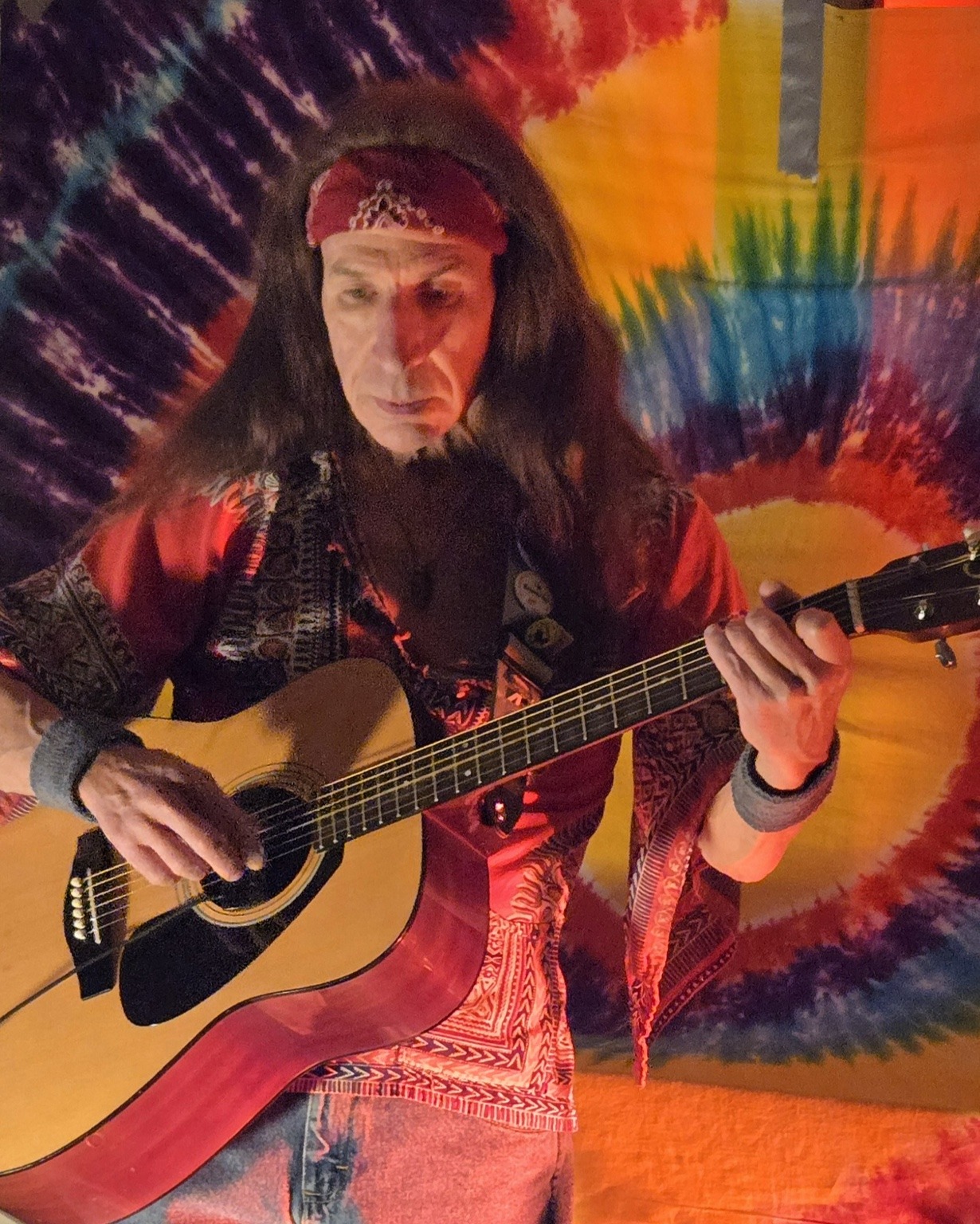 Dave Treen performing acoustic guitar